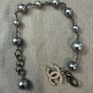 CHANEL Gray Pearl Bracelet with Silver Logo